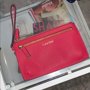 Hot pink Calvin Klein wristlet